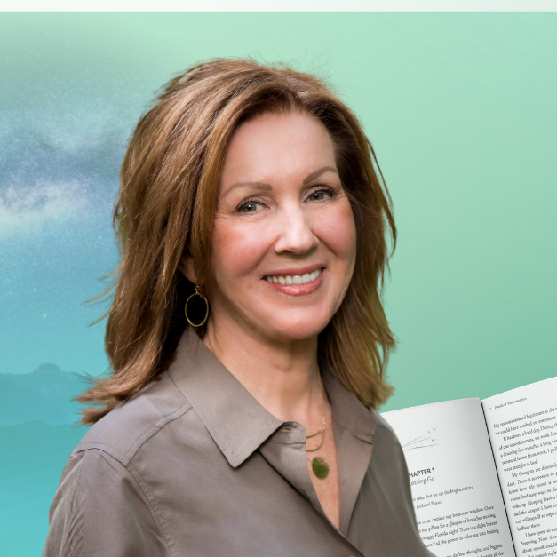 Sue Scarborough in front of green background in grey brown shirt and book portal of transcendence